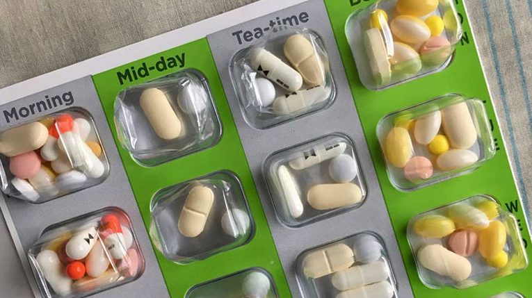 Compliance blister packs with medications sorted by day and time