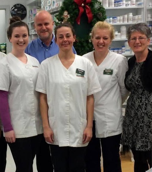 Ryan's Pharmacy team gathered together during the holidays